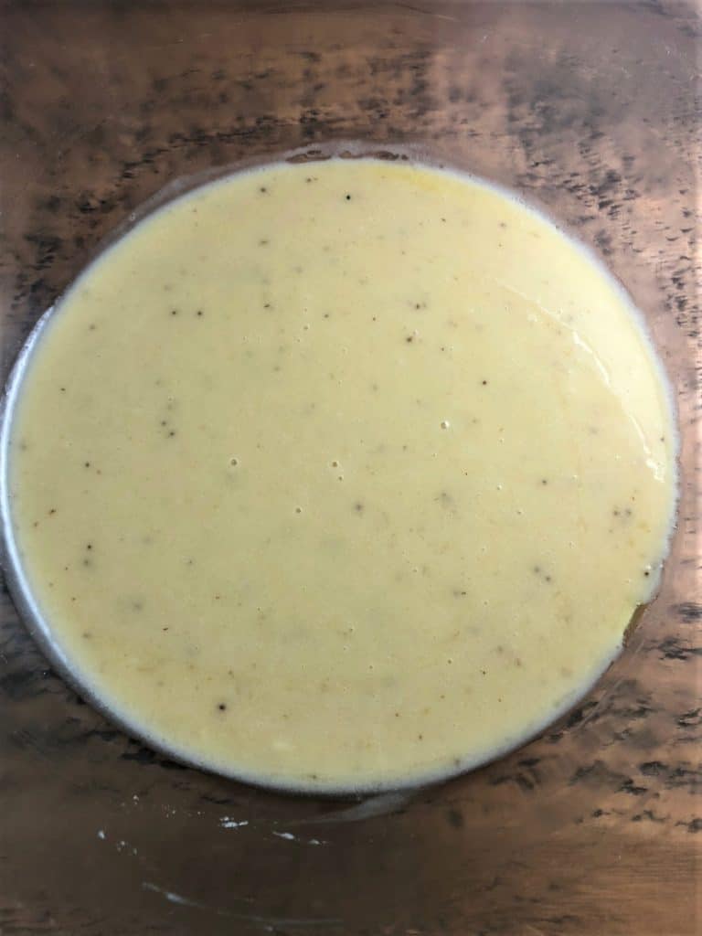 wet mixture of bananas egg and butter