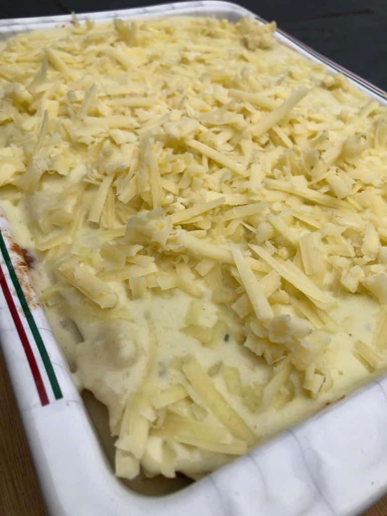 beef lasagna in a dish ready for the oven