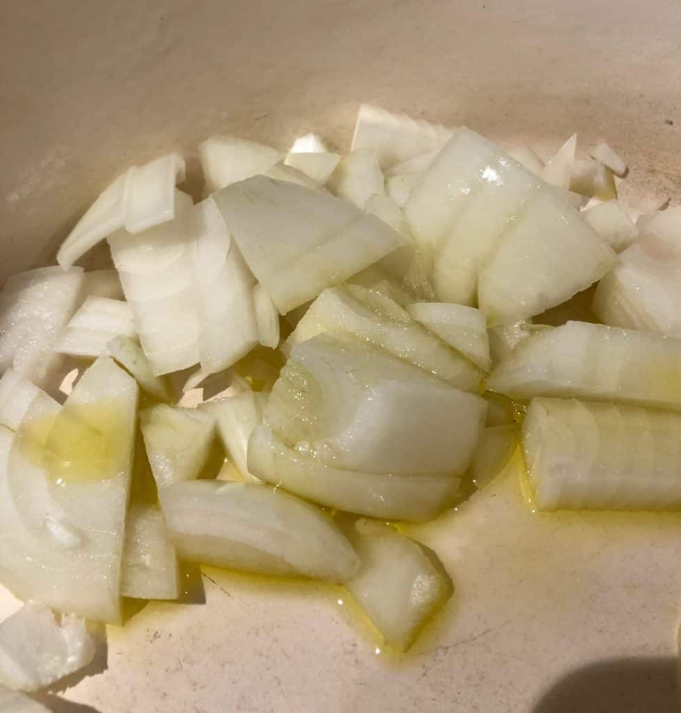 diced onion in olive oil in pan