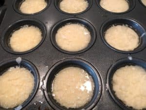 yorkshire pudding batter in tray ready for oven