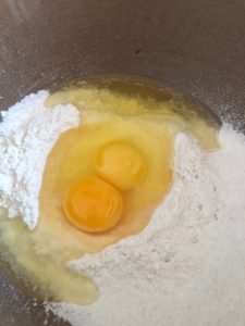 flour and eggs in a bowl