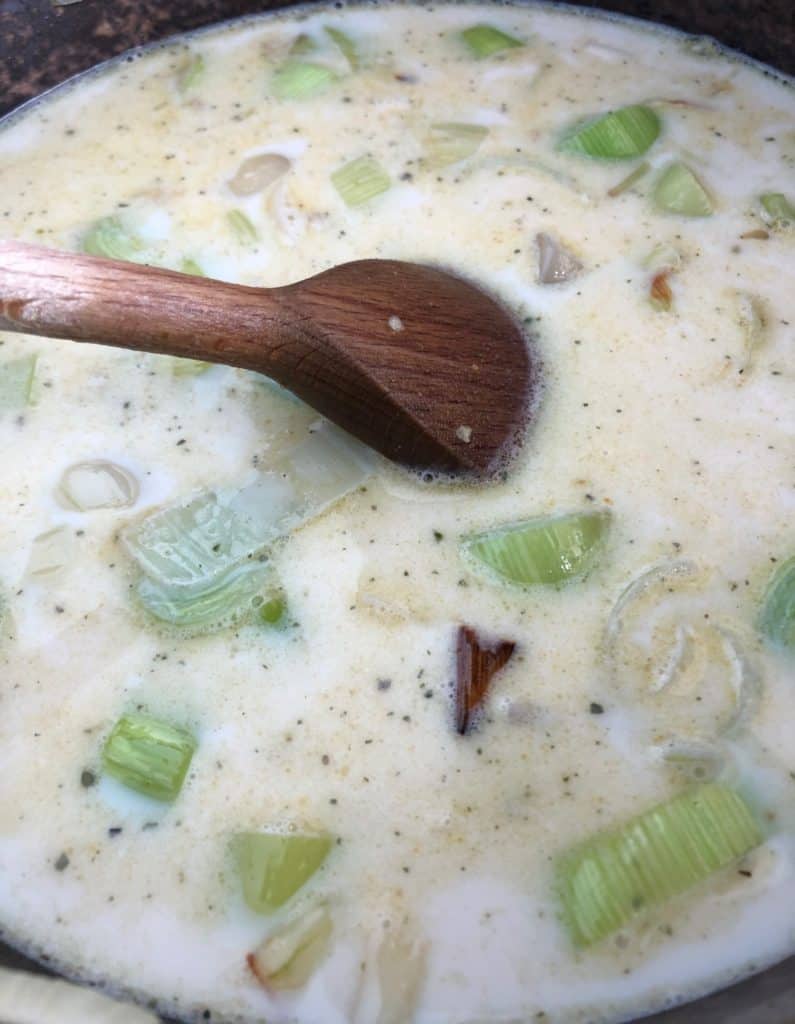 chopped leek onion in milk and stock