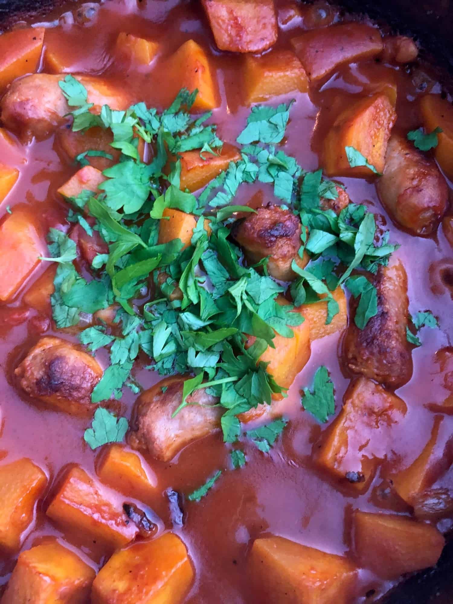 sausage and pumpkin casserole with fresh parsley