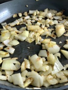 Easy fish curry onions in pan step 1