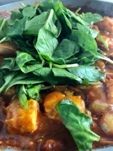 Easy fish curry in pan with spinach