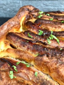 toad in the hole sausages cooked in yorkshire pudding batter