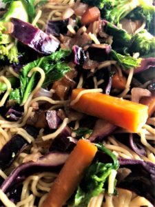 winter veg stir fry with noodles in pan