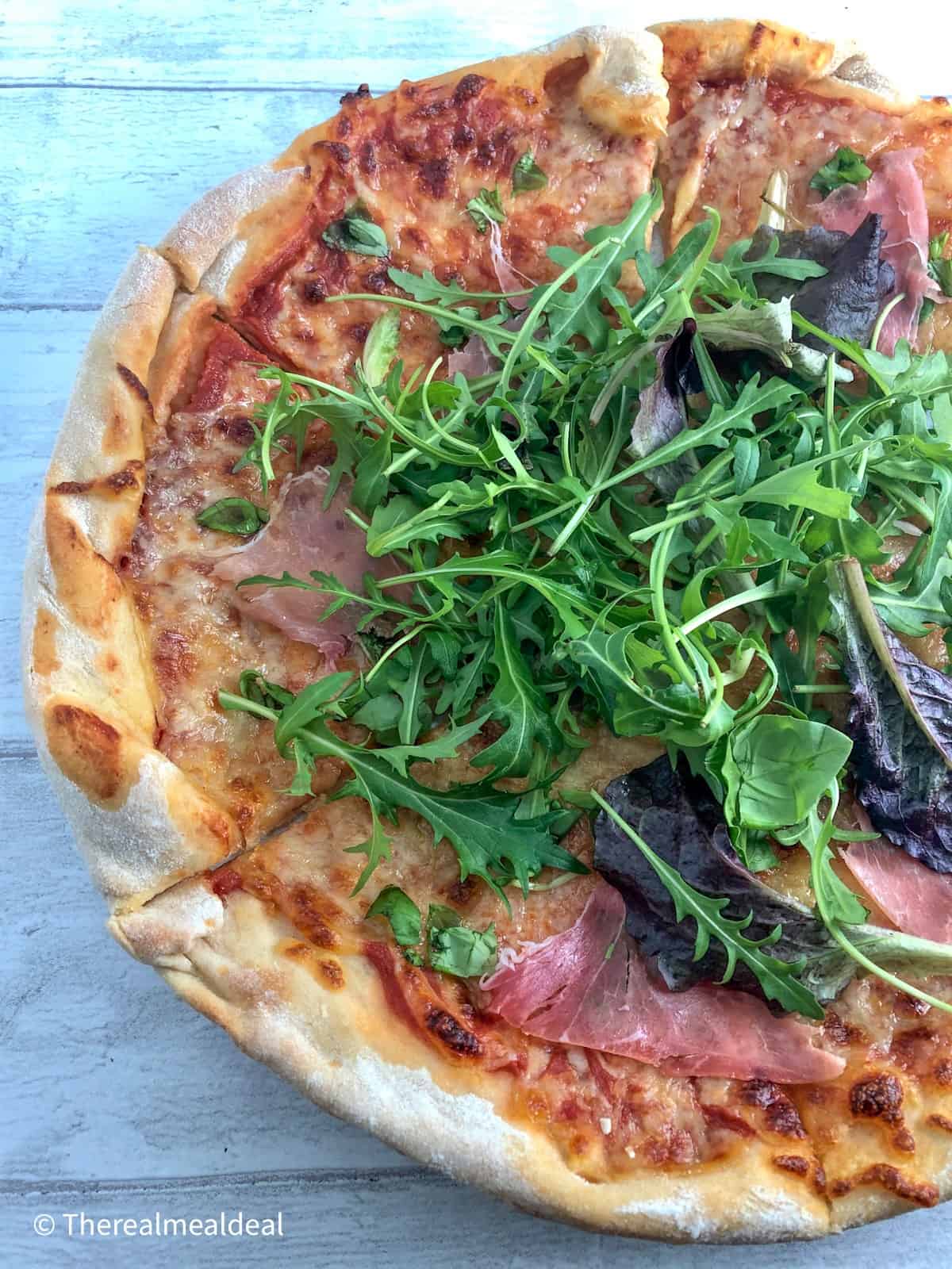 pizza with rocket and parma ham