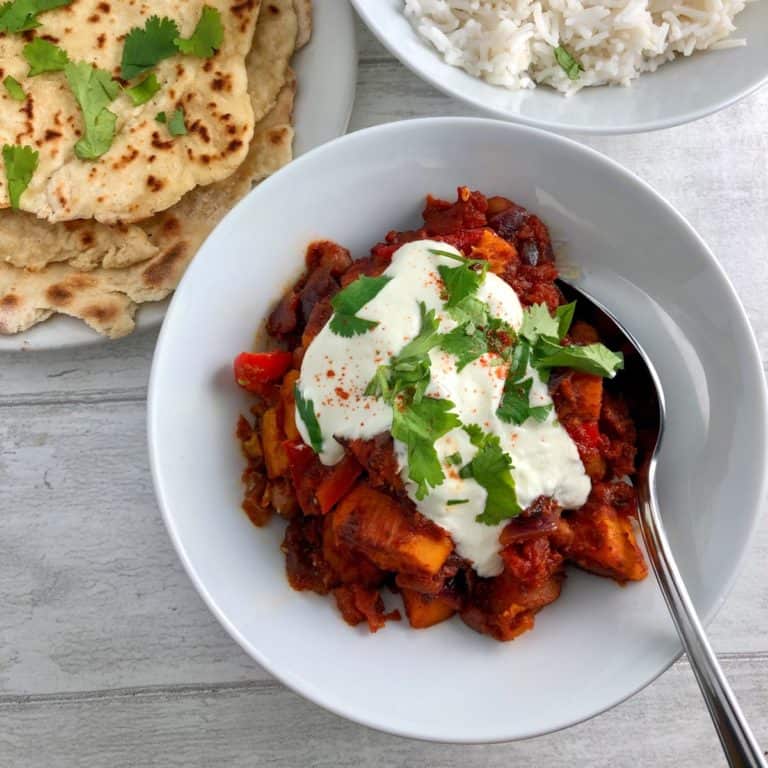 Sweet potato chilli with soured cream and flatbreads and rice