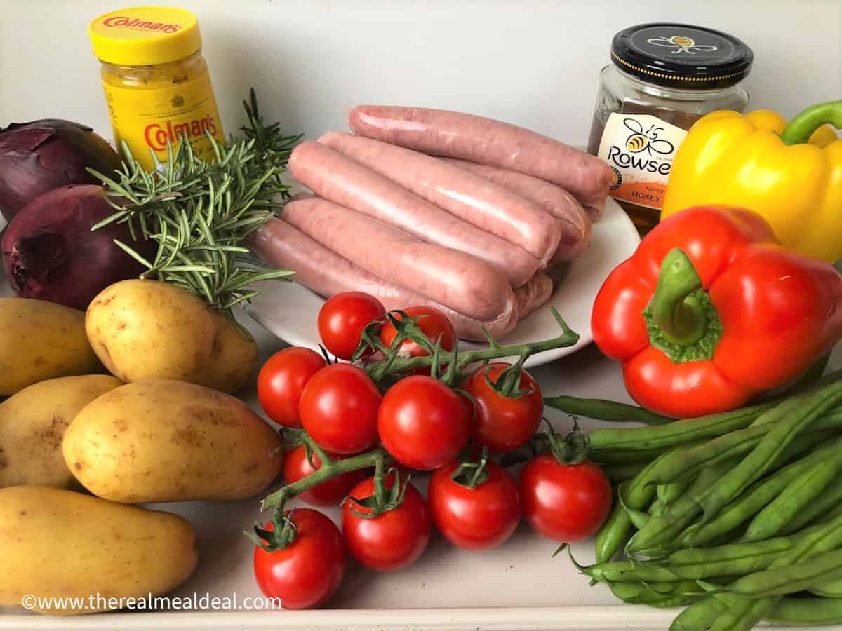 ingredients for sausage tray bake on tray