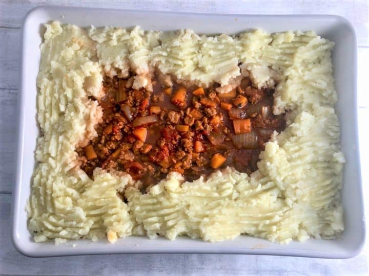 quorn mince covered with mashed potato starting on outside working inwards