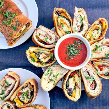 stromboli pizza slices with pizza dipping sauce