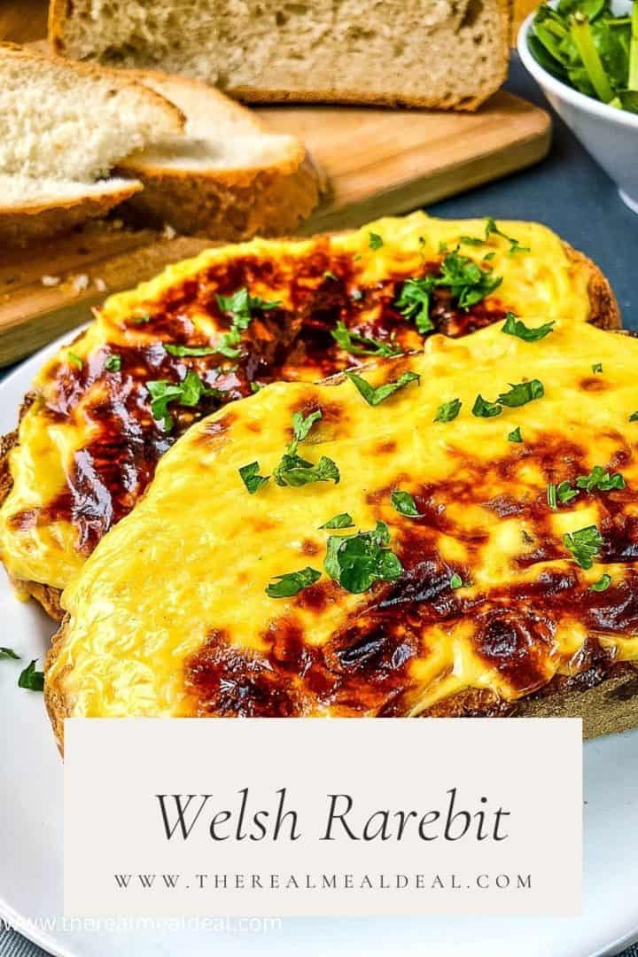 welsh rarebit pinterest image with two slices of rarebit on a plate