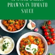pinterest pin showing spanish garlic prawns in tomato sauce topped with creme fraiche