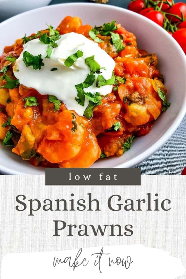 pinterest pin spanish garlic prawns in bowl topped with creme fraiche.