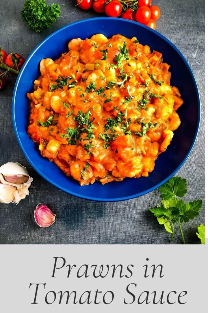pinterest image showing prawns in tomato sauce in bowl