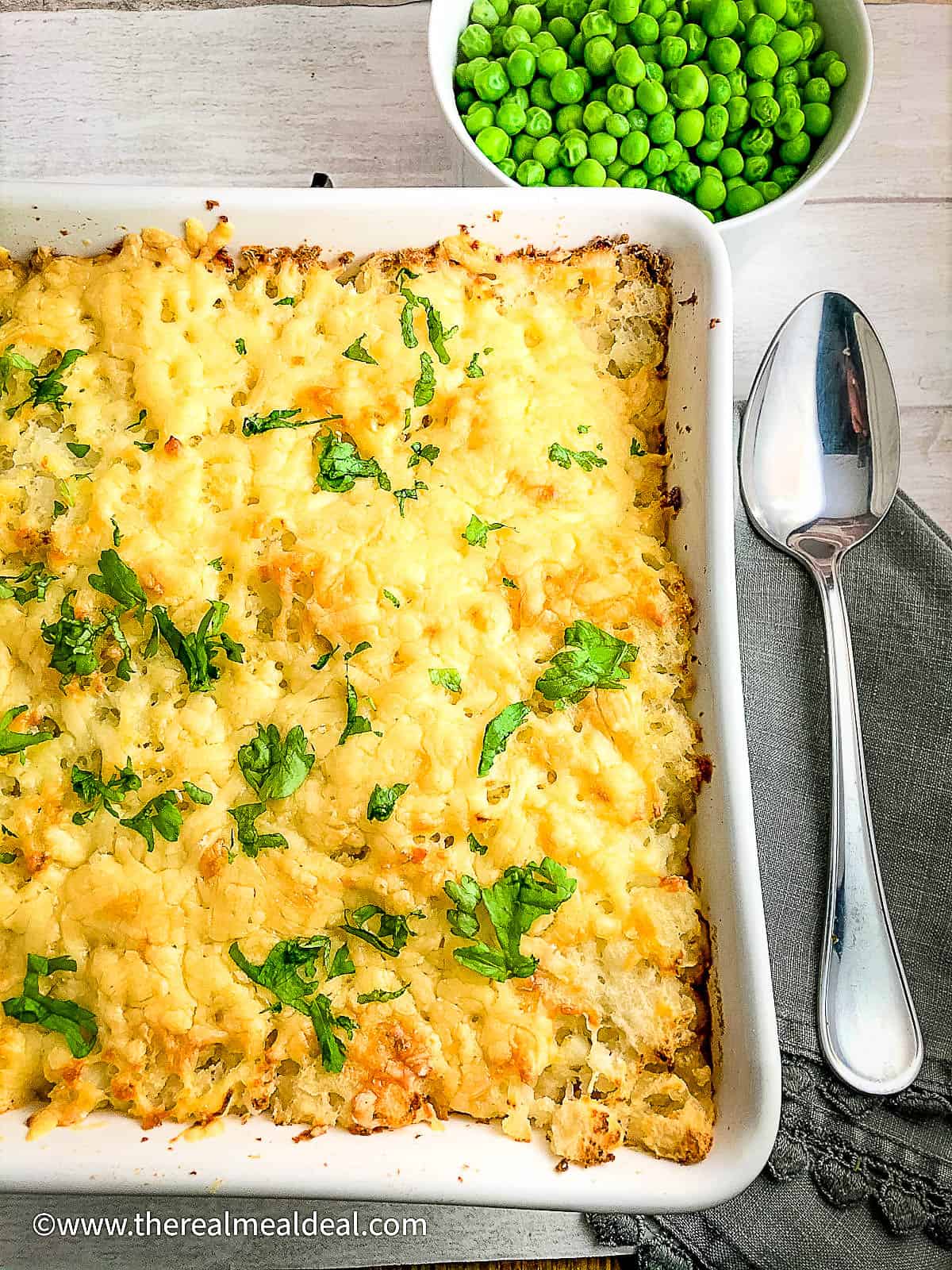 vegetarian cottage pie with mixed beans in dish