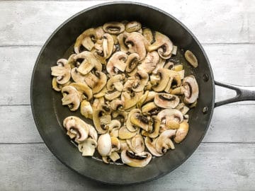 mushrooms frying in pan