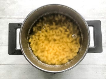 pasta cooking in pan