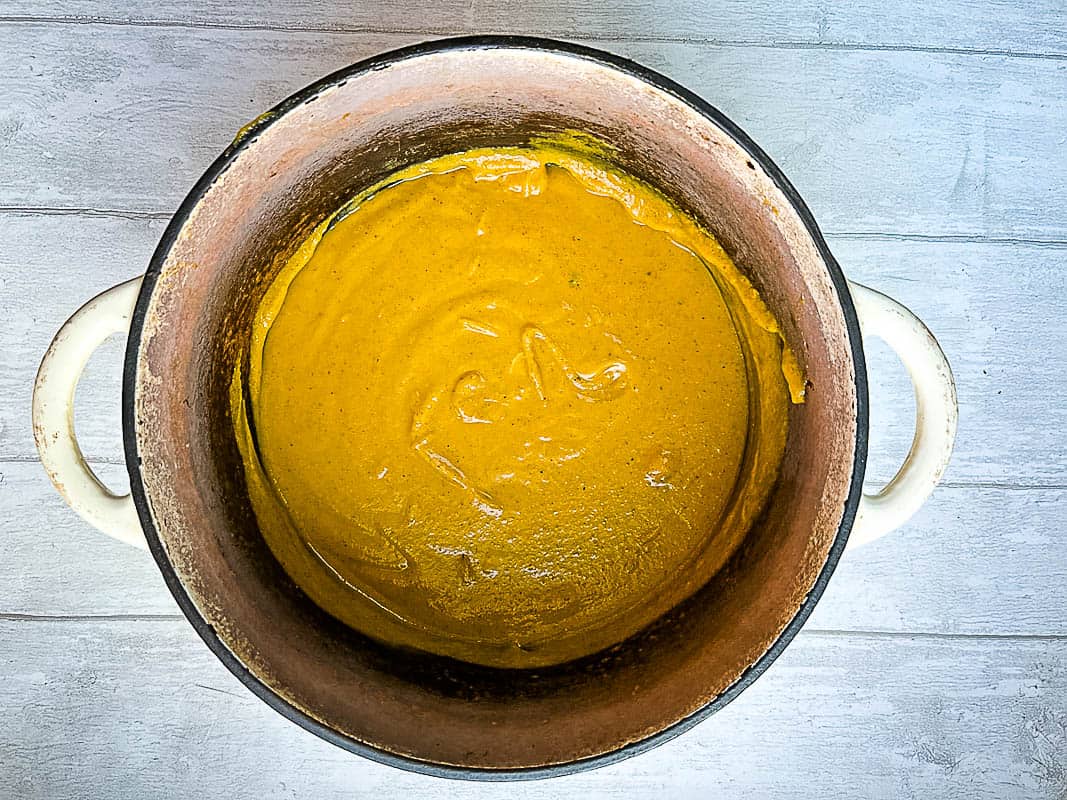 blended carrot and courgette soup in pan