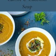 pinterest image for carrot and courgette soup with soup in bowl