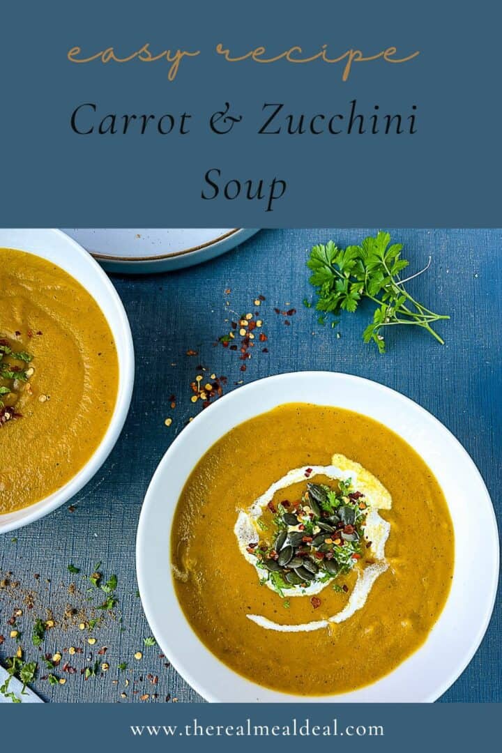 pinterest image for carrot and courgette soup with soup in bowl