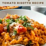 pinterest image for tomato risotto showing finished dish topped with parmesan cheese