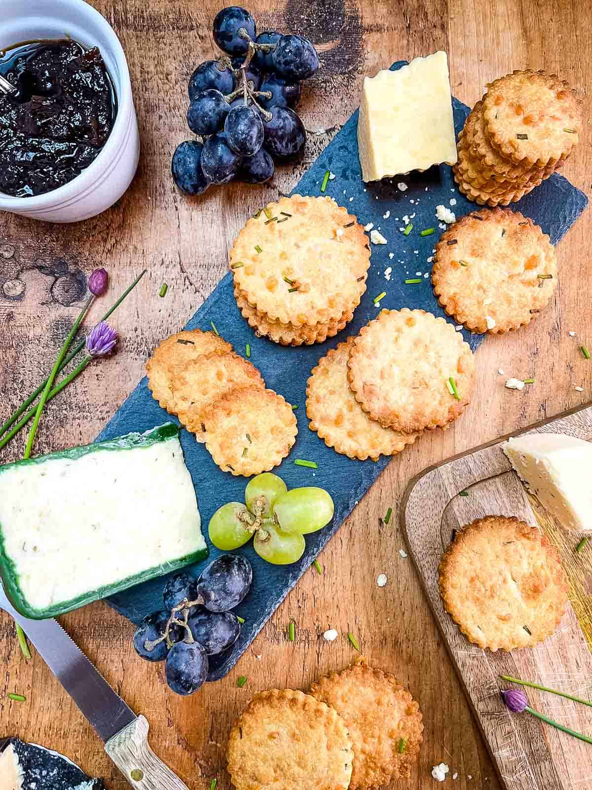 cheese biscuits with chives on slate served with cheese