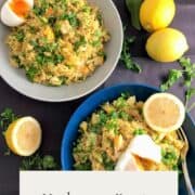 kedgeree with smoked haddock in dish topped with fresh parsley and hard boiled egg and lemon half