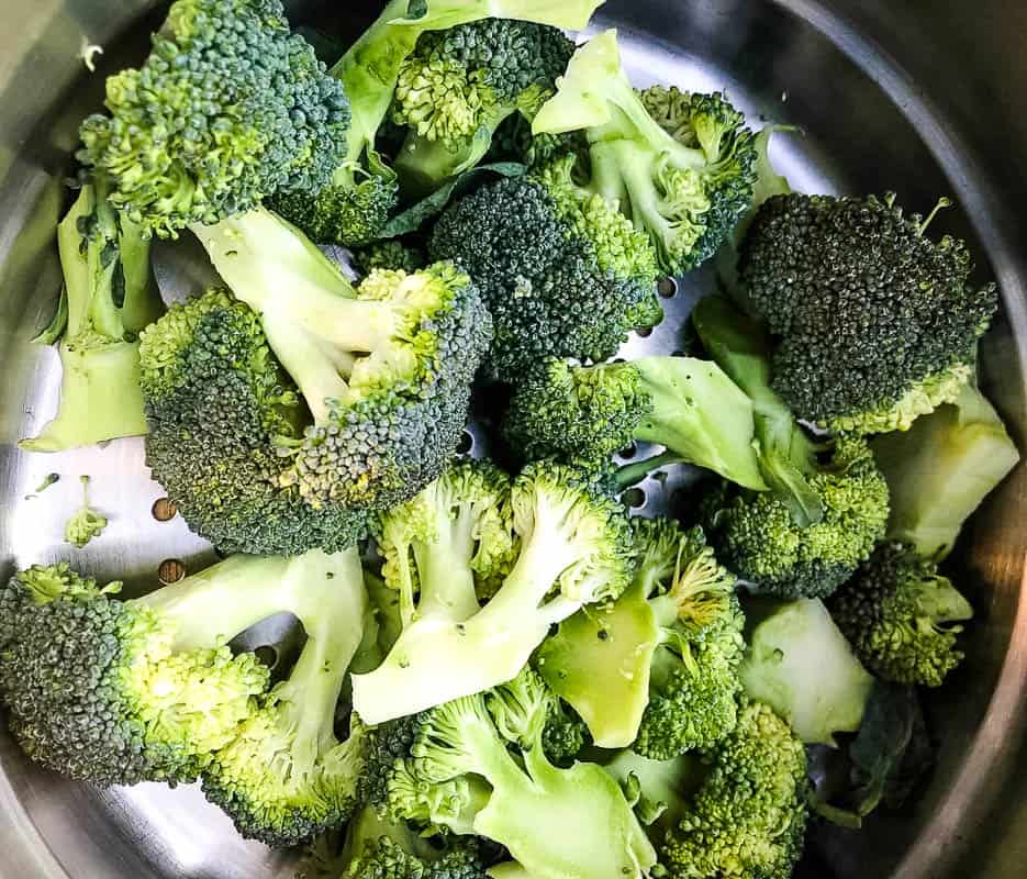 broccoli steaming over rice.