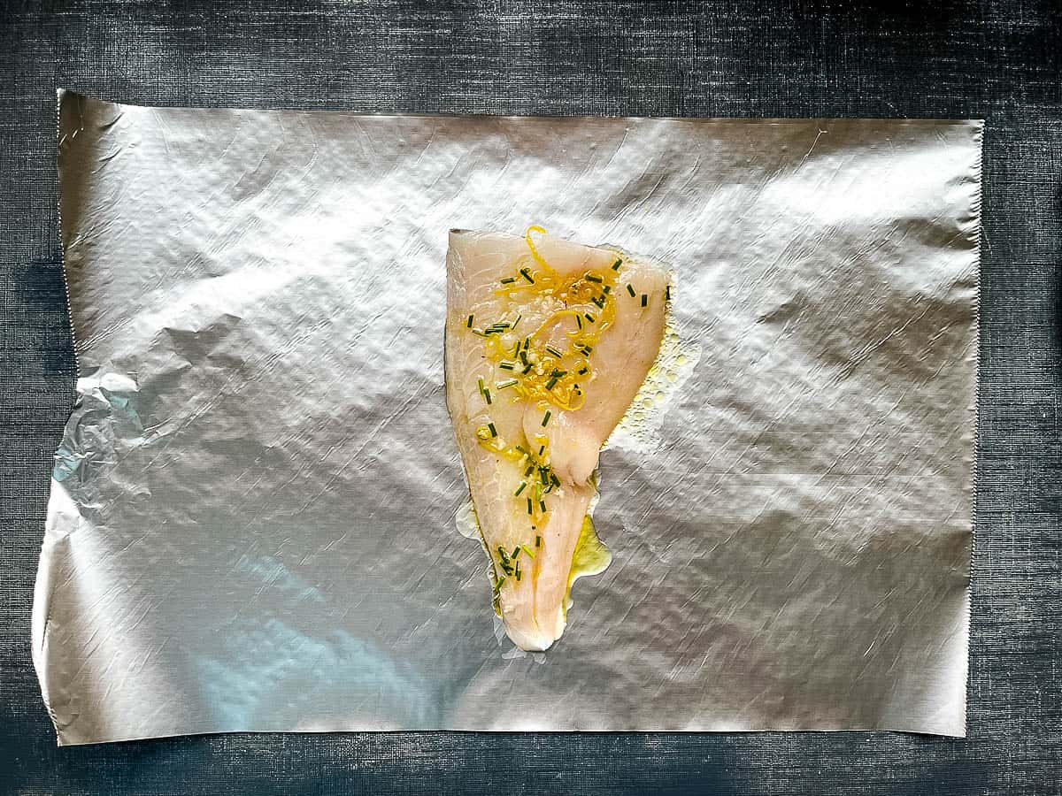 haddock fillet with dressing on sheet of foil