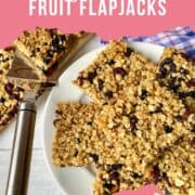 fruit flapjack sqaures on a plate