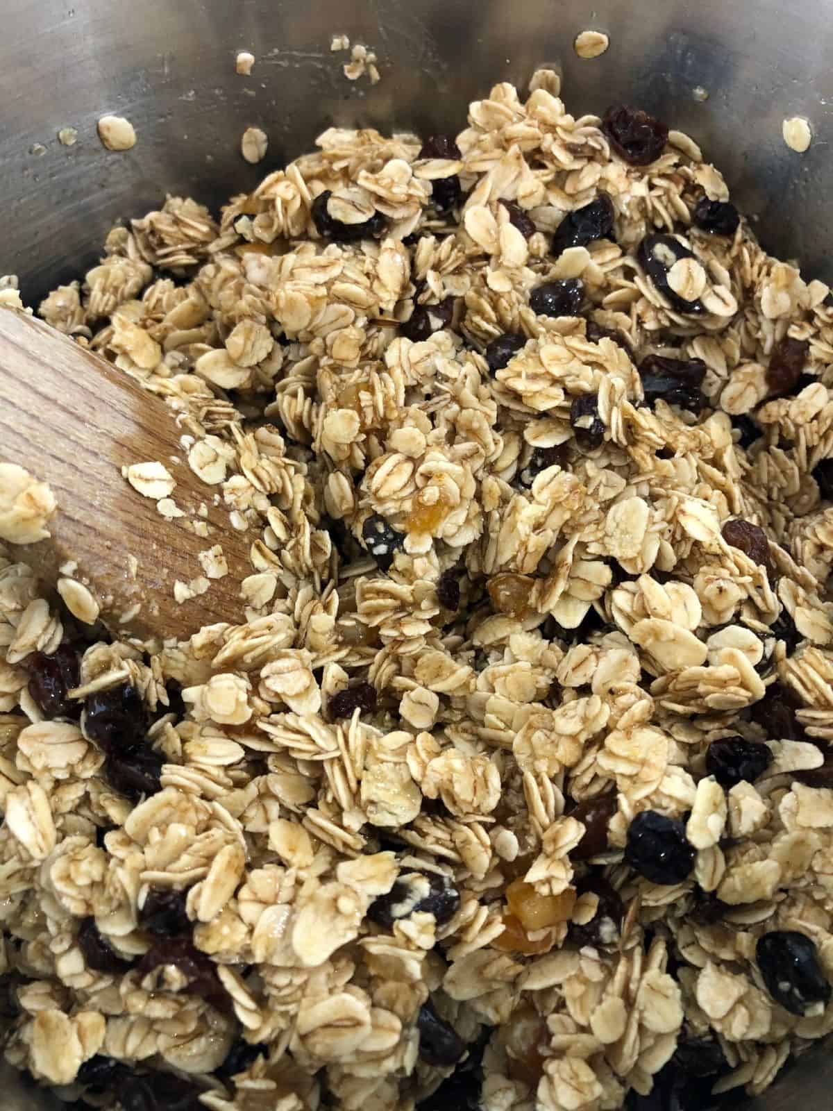 dried mixed fruit, oats stirred together with butter, sugar and golden syrup in pan.