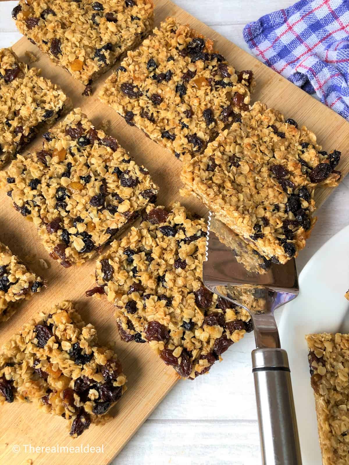 flapjack squares on a wooden board.