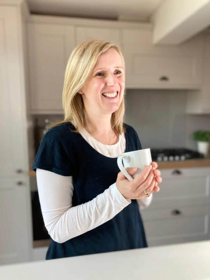 profile picture of Claire in her kitchen.