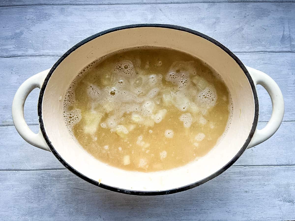 fish stock added to arborio rice.