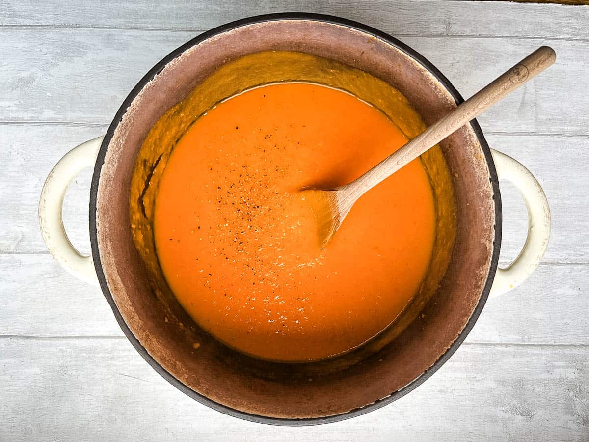 red pepper and sweet potato soup blended in pan