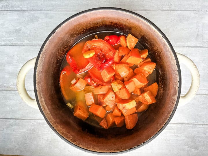 roasted vegetables added to stock in pan.