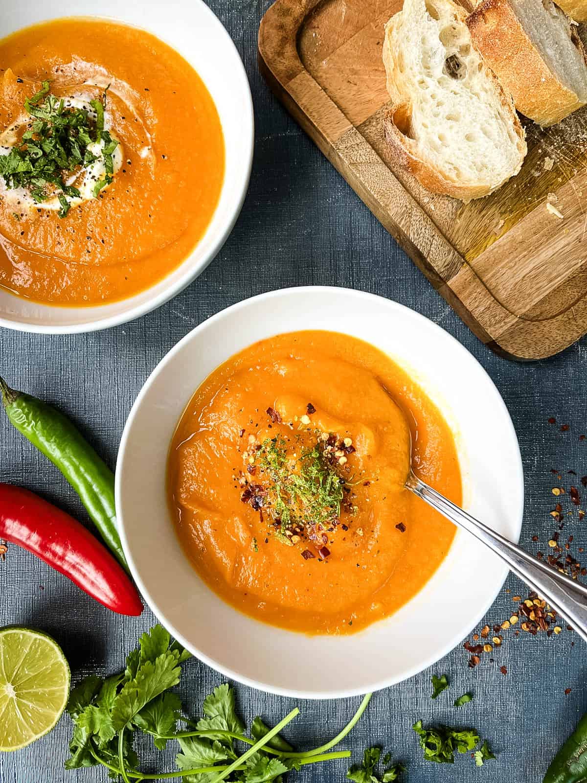 sweet potato soup topped with lime zest and crushed chilli flakes served with crusty bread.