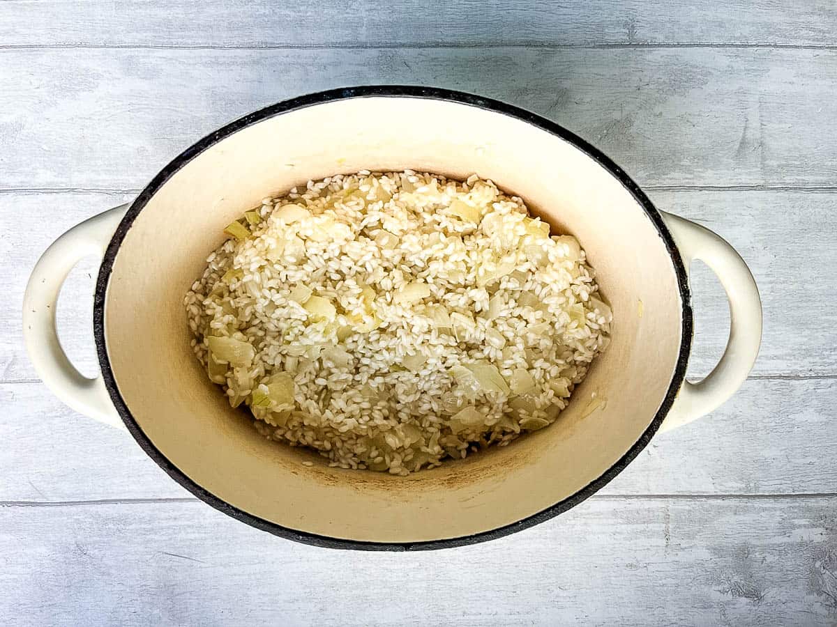 arborio rice and onion in pan