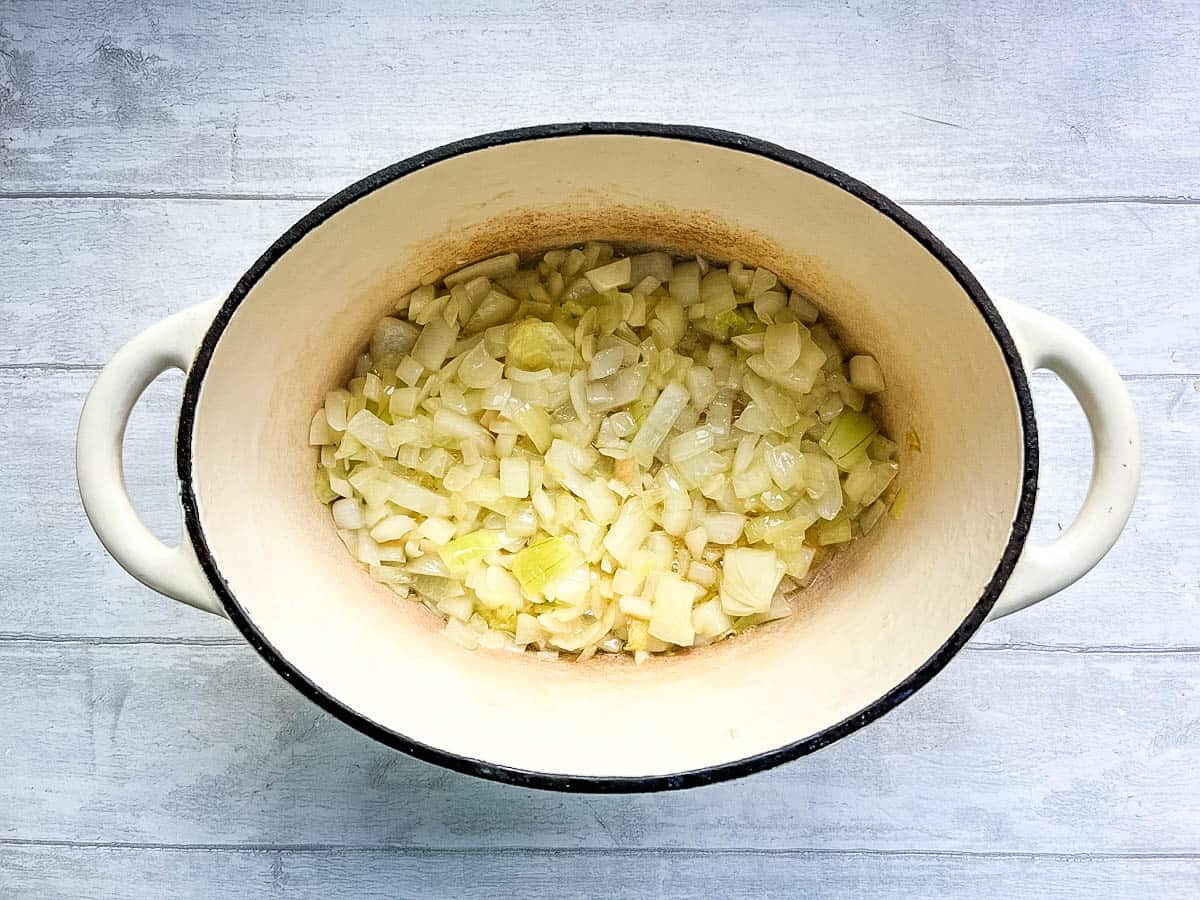 onions frying in butter in pan.