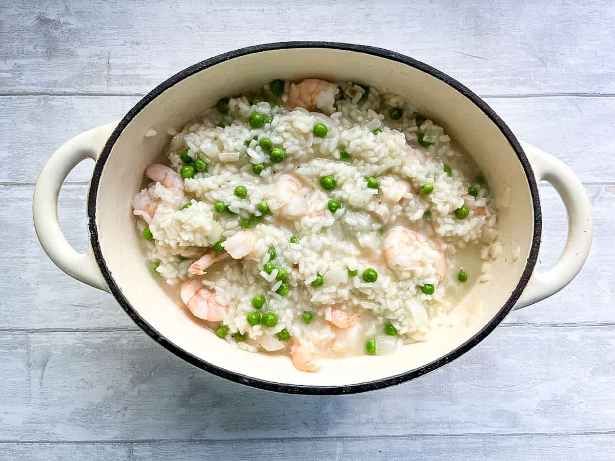 prawns and peas added to cooked arborio rice.