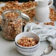 coconut banana bread granola in a bowl and jar.