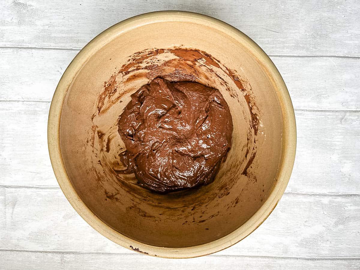 blended peanut butter bananas and cocoa powder in a bowl.