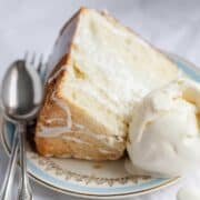 slice of banana chiffon cake on a plate next to a scoop of ice cream