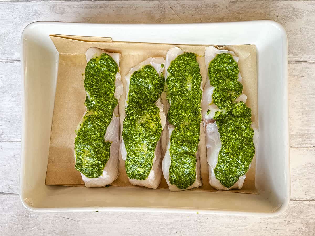 cod loin fillets topped with homemade green basil pesto.