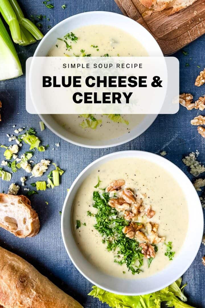 two bowls of blue cheese and celery soup topped with fresh herbs and walnuts