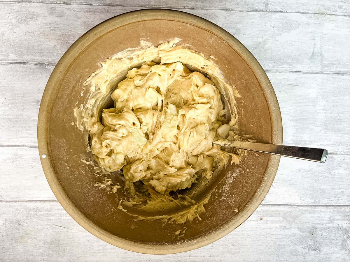 cake batter with chopped apple and pear mixed in