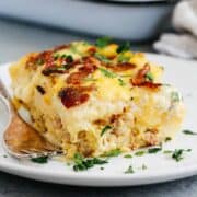 sausage and potato breakfast casserole on a plate.