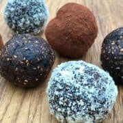 selection of chocolate energy balls on a board.